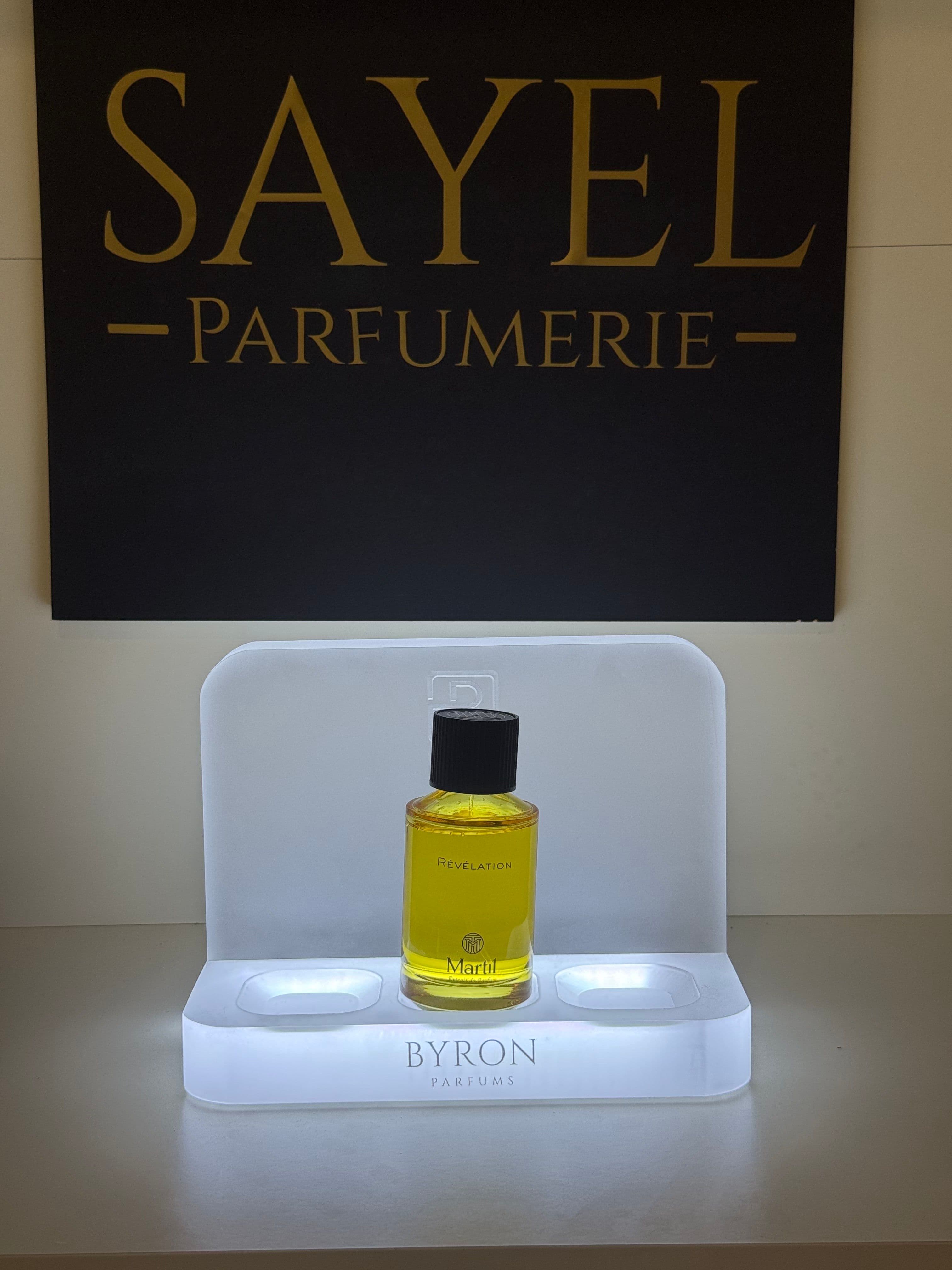 Flacon du parfum Révélation par Martil